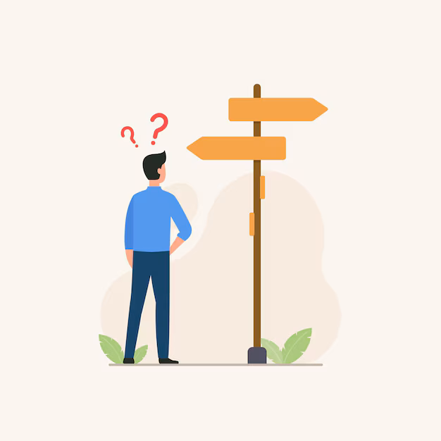 A man looking at a sign with two directions to choose from.